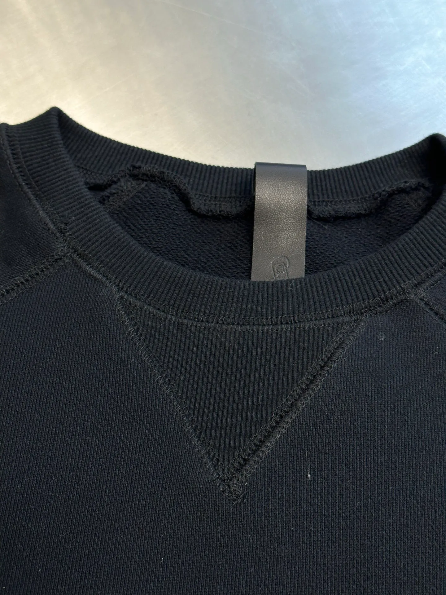 P410 Chrome Hearts Logo Round Neck Sweatshirt Made of custom-made heavy fortress intertwined air cotton fabric, Chrome Hearts cross patch embroidery decoration on the chest, becoming the ultimate interpretation of dark Gothic style. CH Gothic font is the finishing touch on the back panel. The logo iron plate sways slightly with the swing of the body, adding a sense of movement and vitality.  Using imported machine appliqué embroidery technology, advanced computer control systems and precision mechanical components are used to achieve the Chrome Hearts logo appliqué operation, presenting an embroidery effect with both clarity and three-dimensionality.  size：s m l xl